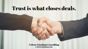 A picture of two hands shaking with the words "Trust is what closes deals."